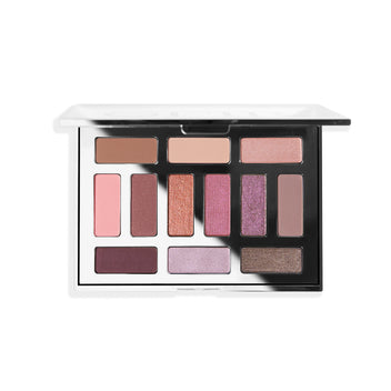 Twelve-shade eyeshadow palette featuring a mix of matte and shimmer finishes in neutral and pink tones.