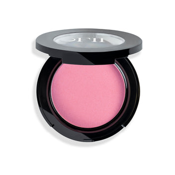 Compact pink blush in a sleek black case with a clear lid, showcasing a vibrant, smooth texture.