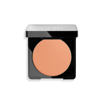 Pressed face powder in a sleek black compact with a soft, deep tan nude, powder shade.