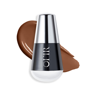 OFIR foundation bottle with a swatch of a deep neutral nude-colored liquid foundation on a blank background