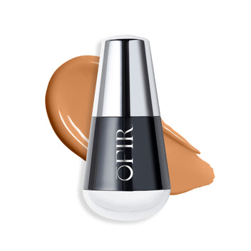 OFIR foundation bottle with a swatch of a tan warm nude-colored liquid foundation on a blank background