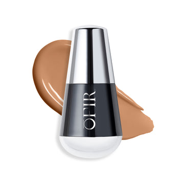 OFIR foundation bottle with a swatch of a tan neutral nude-colored liquid foundation on a blank background