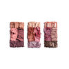 Three rows of crushed eyeshadow palettes showcasing a range of pink, mauve, and neutral tones.