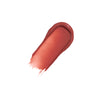 warm terracotta pink lip-gloss swatch with a smooth, shiny, and glossy texture