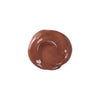 deep shade liquid swatch of tinted moisturizer, smooth texture with a glossy finish