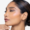 Full face make up look showcasing a 
deep brown eye liner