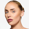 Full face make up look showcasing a berry pink lipstick