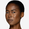 Full face make up look showcasing a 
deep bronzer