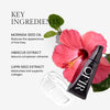 Key ingredients description: Moringa seed oil for reducing fine lines, hibiscus extract as a natural complexion refresher, and lupin seed extract to moisturize and support collagen. Features a tube with text "OFIR" alongside a vibrant hibiscus flower.