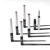 Lineup of OFIR Brow Tonic products standing upright on a white background. Five tubes with silver caps and black bases display different tinted shades, with one tube open to reveal a fine brush applicator.