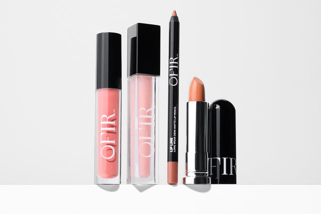 makeup products displayed on a white background: two pink lip glosses, a lip liner pencil, and a nude lipstick.