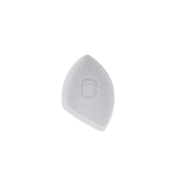 A light gray, teardrop-shaped makeup sponge featuring a soft texture and a subtle embossed circular design in the center.