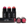 Assorted cream blush sticks on black tubes,  revealing the rounded blush tips and vibrant pink-purple hues. Blank background