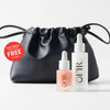 OFIR Daily Glow Kit in Peony displayed with two dropper bottles in front of a black leather drawstring Cinch Pouch Bag. Badge reads "The Cinch Pouch Bag FREE $12 Value