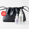 OFIR Daily Glow Kit in Lilac displayed with two dropper bottles in front of a black leather drawstring Cinch Pouch Bag. Badge reads "The Cinch Pouch Bag FREE $12 Value