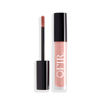 A sleek, black-capped tube of nude pink liquid lipstick is shown alongside its applicator wand.