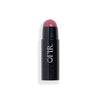 Cream blush stick in a black tube, revealing a rounded blush tip in a purplish shade. Blank background