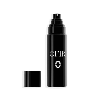 Sleek black spray bottle with the brand name "OFIR" and a distinctive circular logo, featuring a removable cap placed beside it.