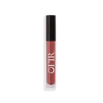 Clear tube of a warm terracota pink liquid lip gloss with a black cap