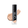 OFIR concealer bottle against a white background with a swatch of cotton shade makeup behind it