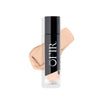 OFIR concealer bottle against a white background with a swatch of silk shade makeup behind it