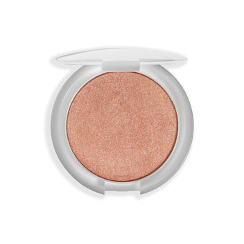 A sleek round compact featuring a shimmering peach highlighter with a smooth, metallic finish.