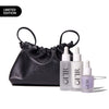 Limited edition black drawstring bag with three skincare dropper bottles labeled "OFIR".
