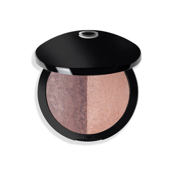 Dual-tone compact with shimmering pink and mauve shades in a sleek black case.
