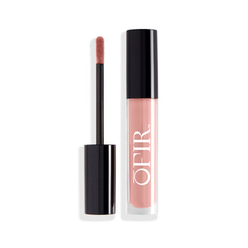 A sleek, black-capped tube of nude pink liquid lipstick is shown alongside its applicator wand