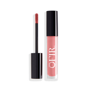 A sleek, black-capped tube of pink liquid lipstick is shown alongside its applicator wand