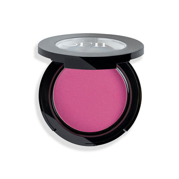 A vibrant pink blush in a sleek, round black compact with a transparent lid showcasing the color.