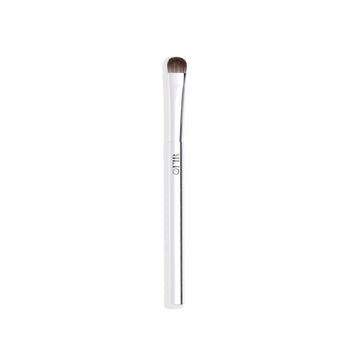 A sleek makeup brush with a white handle and soft, rounded bristles, suitable for eye makeup application.