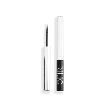 A sleek liquid eyeliner pen with a precision brush tip and a black handle featuring the brand name "OFIR" in white lettering.