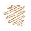 Tan-colored makeup pencil swatch on a white background, showcasing its creamy texture and pigmentation.