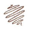 Brown pencil strokes on a white background, showing the texture and color of a cosmetics eyeliner or brow pencil.