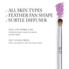 A makeup brush features soft vegan fibers and a feathered shape for a gradient effect, suitable for all skin types.