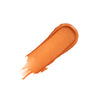 burn orange lip-gloss swatch with a smooth, shiny, and glossy texture