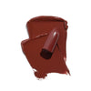 Deep burgundy lipstick smear with a broken tip, showcasing a rich, creamy texture.