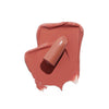 Creamy nude lipstick with smooth, smudged application showcasing its rich texture and finish.