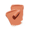 Creamy nude lipstick swatch showcasing a smooth application and glossy finish.