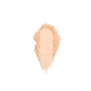 Light beige crushed powder makeup swatch with a smooth center and textured edges