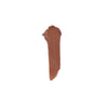 chocolate brown cream makeup swatch with a smooth, glossy texture