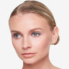 Full face make up look showcasing a 
blue/green eye liner