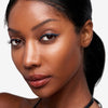 Full face make up look showcasing an electric blue eye liner