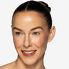 Full face make up look showcasing a warm terracotta pink lip gloss