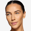 Model showcasing a light to medium pigmentation powder finish
