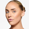 Model showcasing a light pigmentation powder finish