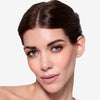 Full face make up look showcasing an orange-ish eyeshadow