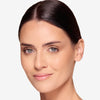 Full face make up look showcasing a 
black mascara