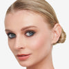 Model showcasing a black eyeliner look